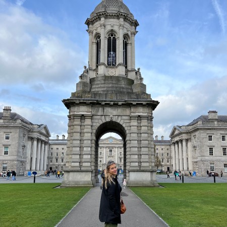 Standing in front of the Campenile at Trinity College in Dublin.